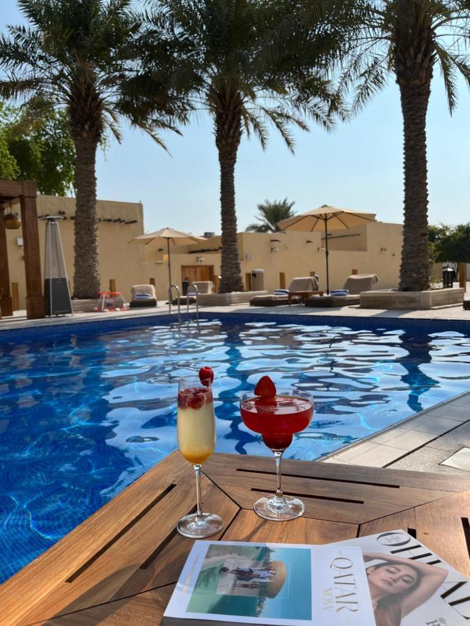 Souq Al Wakra Hotel Qatar By Tivoli Al Wakrah Exterior photo The pool at the Ritz-Carlton, Manama